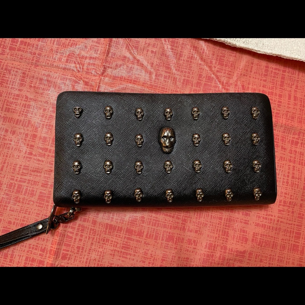 Thomas Wylde skull clutch and wallet combo.